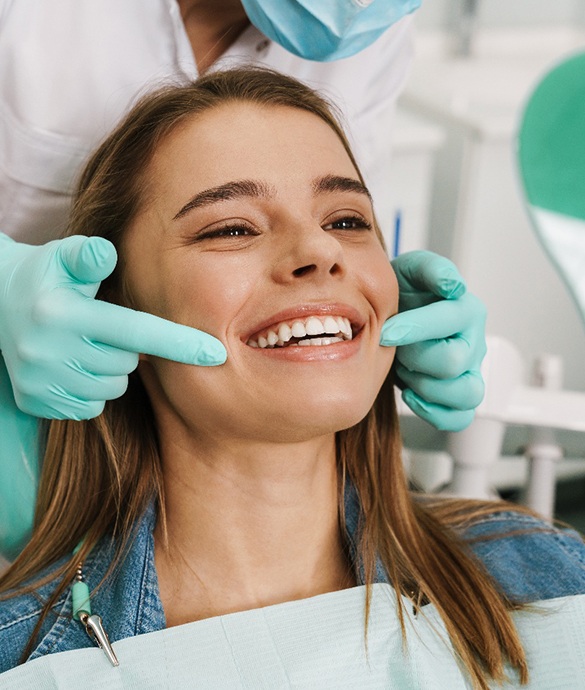 Woman smiling in the dental chair