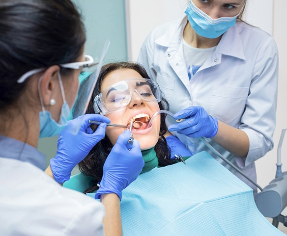Woman getting a dental procedure