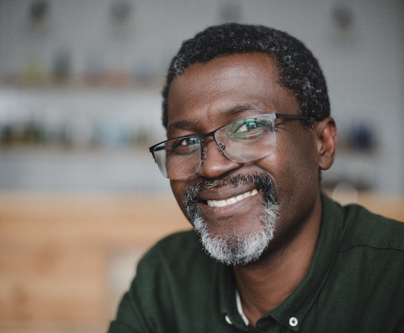 Smiling older man wearing glasses