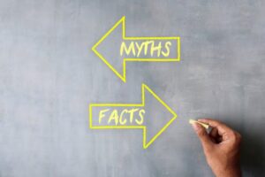 two arrows, one that says myths and one that says facts